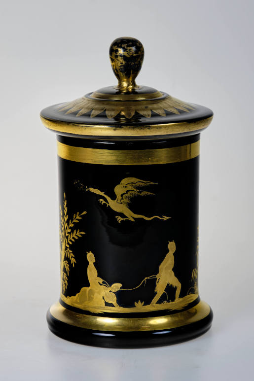 Black "Hyalith" glass jar with satirical gold painting