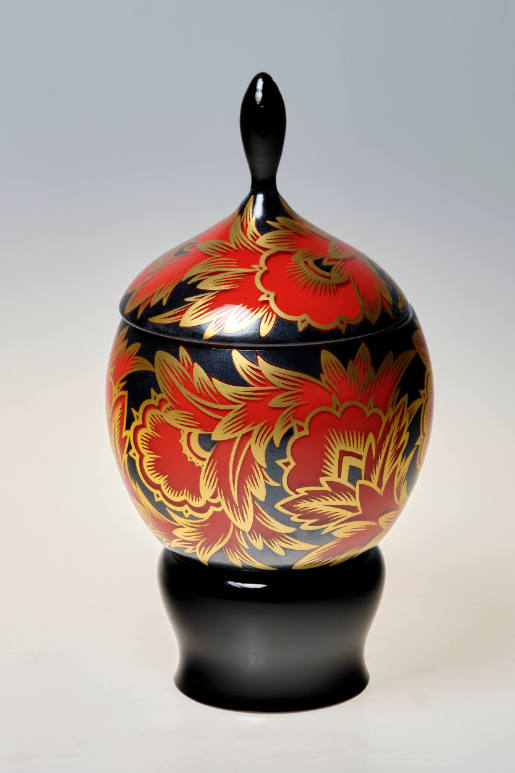 Lidded bowl with enameling inside and outside