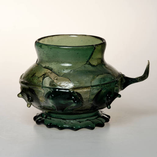 Green cup with handle ("Scheuer") and prunts in the shape of animal heads
