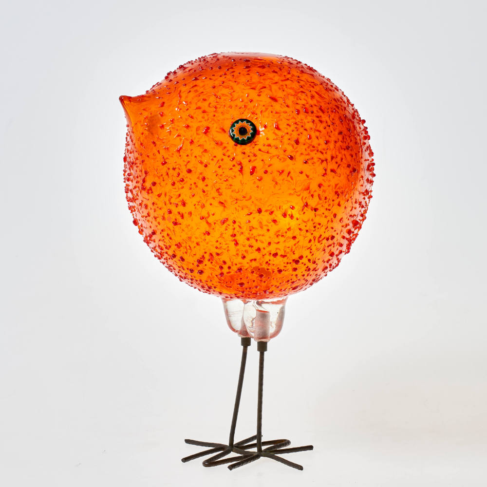 Orangefarbenes Küken (pulcino)