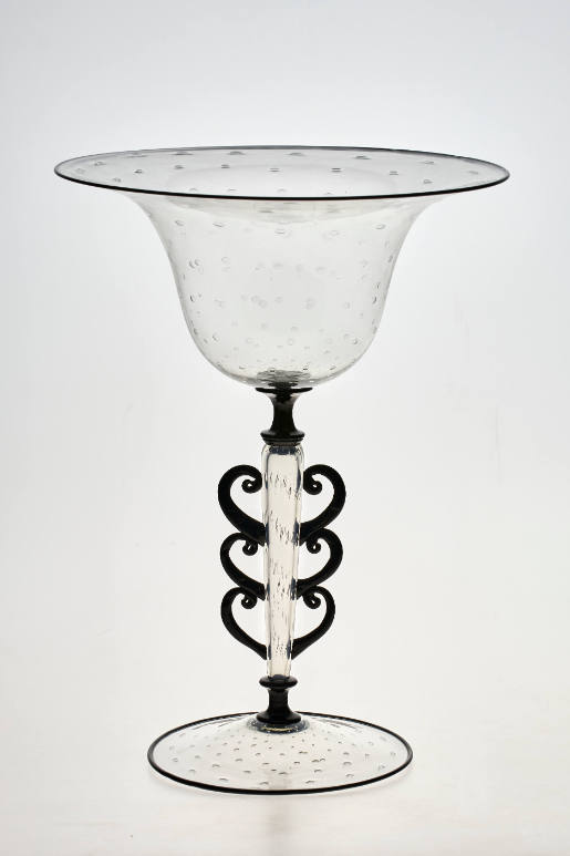 Tall cup with decorated stem