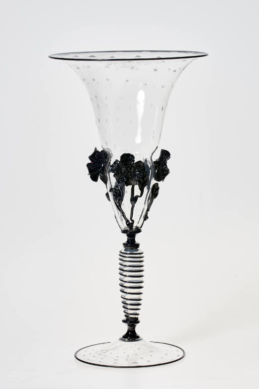 Tall cup with black flowers