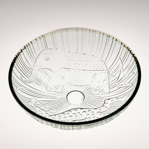 Pressed glass bowl with elefant and panther